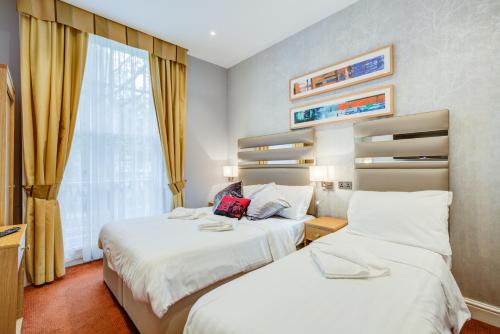 Habitación Triple Estándar del hotel Kingsway Park At Park Avenue