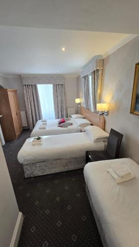 Habitación Cuádruple Estándar del hotel Kingsway Park At Park Avenue. Foto 14