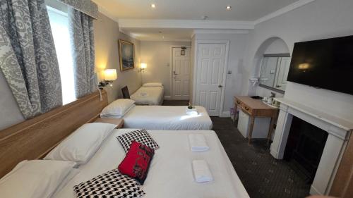 Habitación Cuádruple Estándar del hotel Kingsway Park At Park Avenue. Foto 18