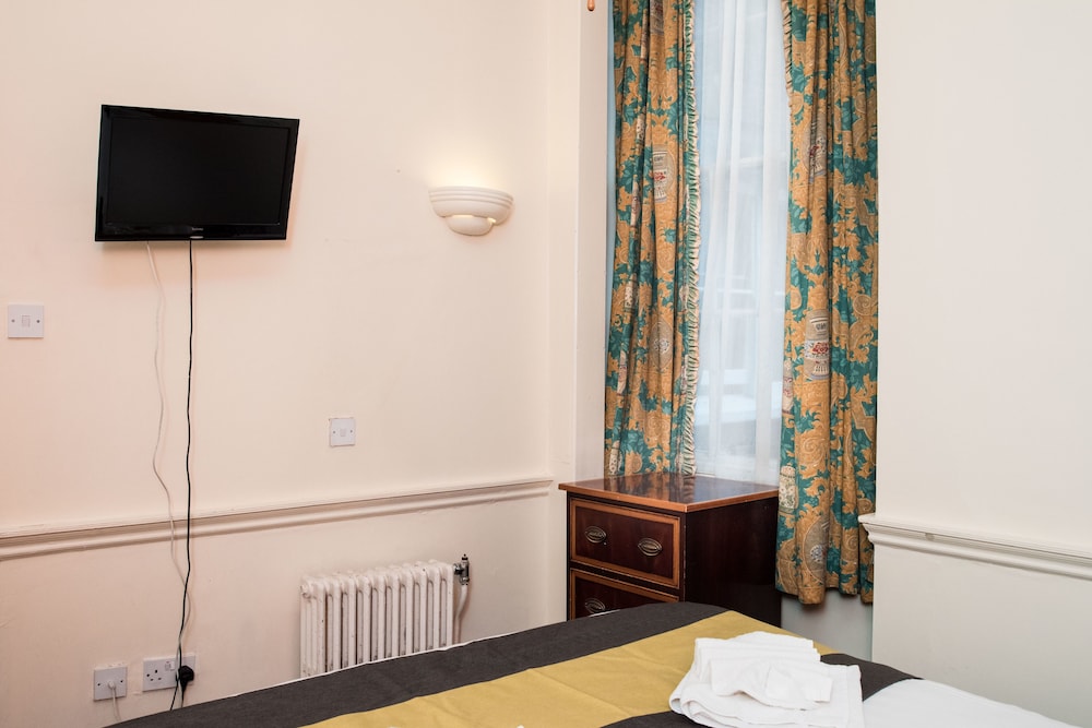 Habitación familiar del hotel Rose Court. Foto 1