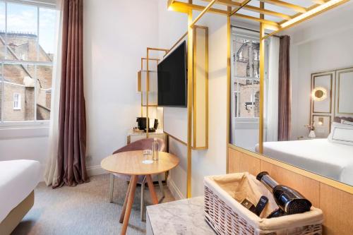 Habitación Individual Clásica del hotel Melia London Kensington a Melia Collection. Foto 19