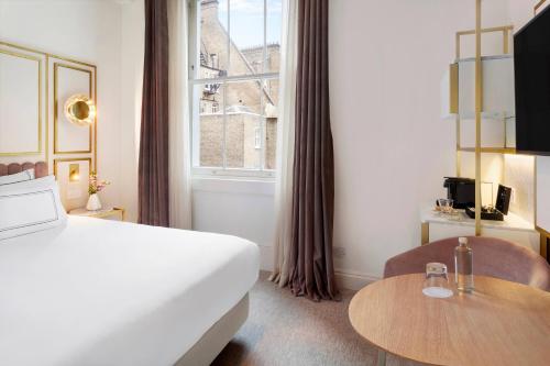 Habitación Individual Clásica del hotel Melia London Kensington a Melia Collection. Foto 38