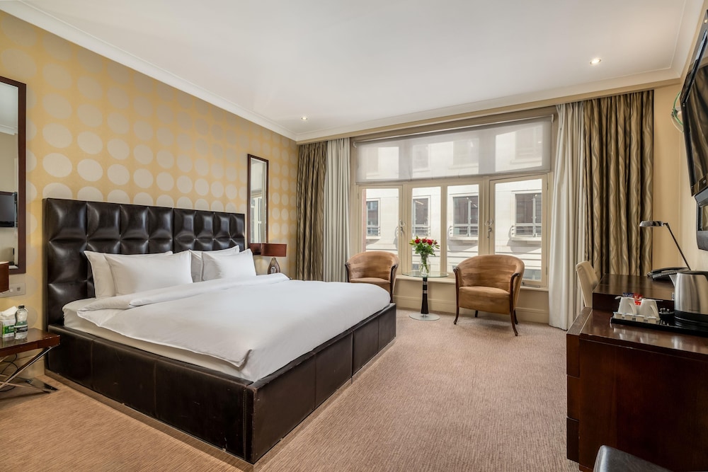 Habitación superior con 2 camas individuales del hotel The Washington Mayfair Hotel. Foto 1