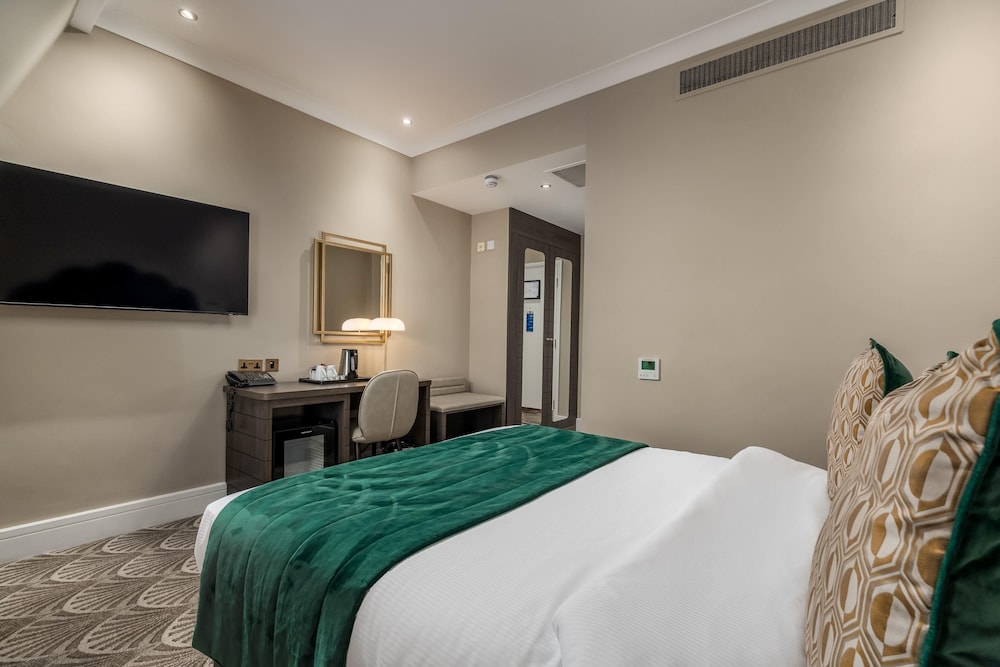 Habitación superior, 1 cama de matrimonio grande del hotel The Washington Mayfair Hotel. Foto 2