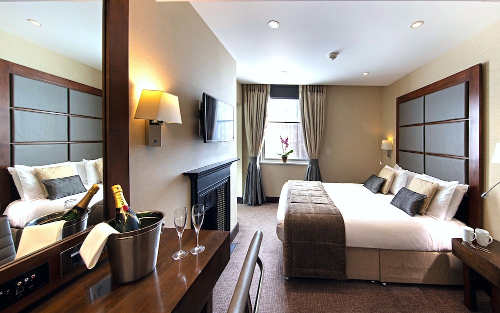 Habitación Superior con cama Queen del hotel Wellington By Blue Orchid. Foto 4