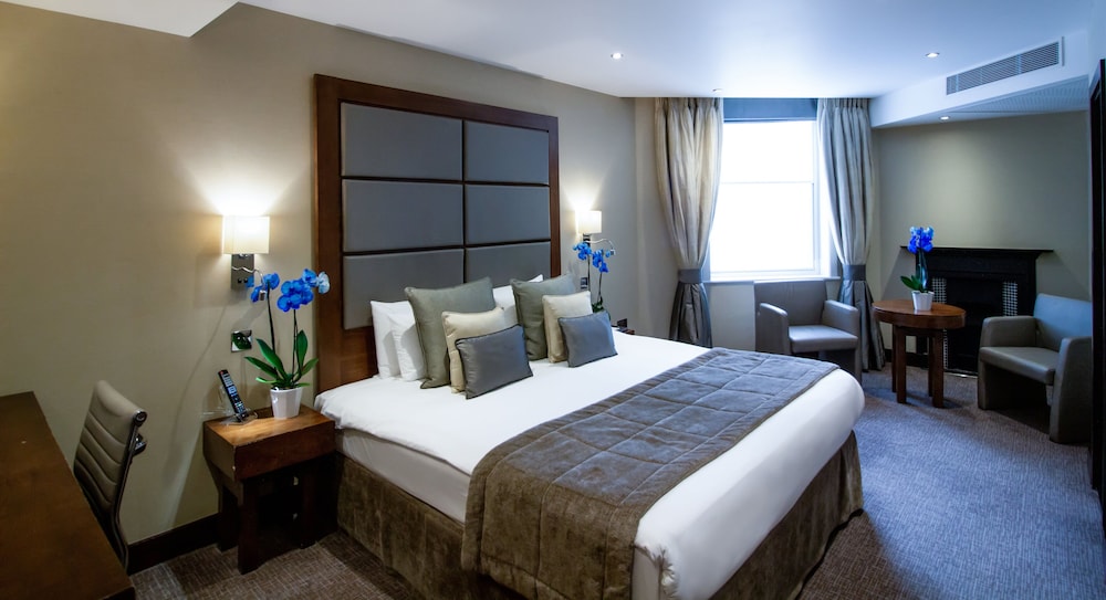 Habitación Deluxe con cama King del hotel Wellington By Blue Orchid. Foto 3
