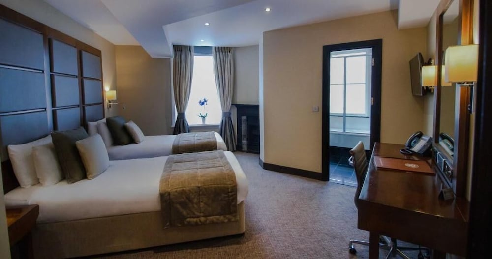 Habitación Deluxe Twin con 2 camas individuales del hotel Wellington By Blue Orchid. Foto 3