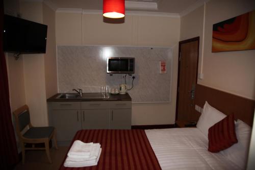 Apartamento de 1 dormitorio del hotel Grove Apartments. Foto 1