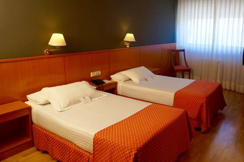 Habitación doble 2 camas del hotel AP Madrid Airport. Foto 1