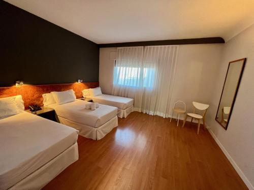 Habitación Triple - Camas Individuales del hotel AP Madrid Airport