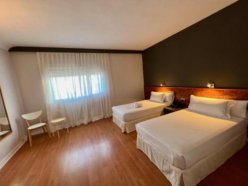 Habitación Familiar Triple - 2 camas del hotel AP Madrid Airport. Foto 3