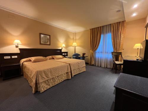 Habitación Triple del hotel Santiago. Foto 5