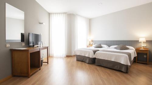 Habitación cuádruple del hotel Isabel De Segura