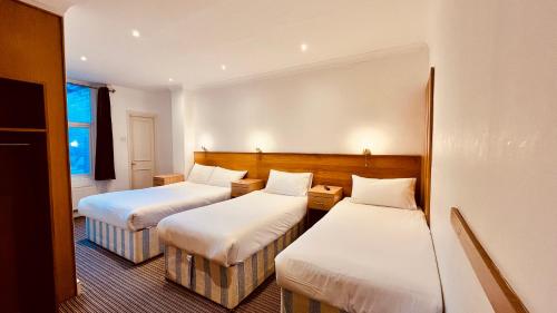 Habitación Cuádruple del hotel West Cromwell. Foto 4