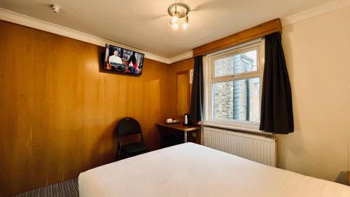 Habitación Doble del hotel West Cromwell. Foto 5