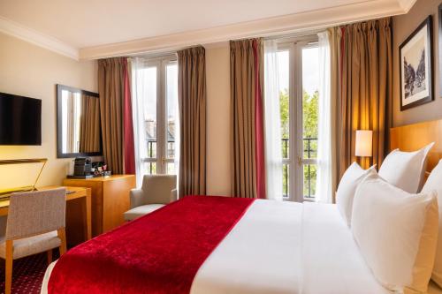 Habitación Deluxe con cama extragrande del hotel Royal Saint Michel. Foto 2