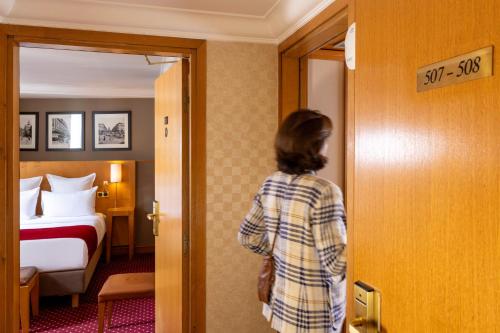 Habitación familiar 1 Cama queen Con Vistas 2 Camas individuales del hotel Royal Saint Michel. Foto 6