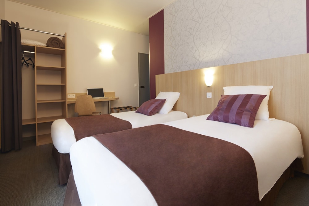 Habitación con 2 camas individuales del hotel HOTEL PARIS VILLETTE