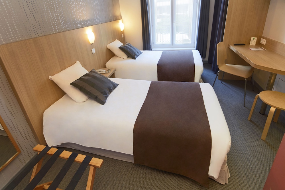 Habitación con 2 camas individuales del hotel HOTEL PARIS VILLETTE. Foto 3