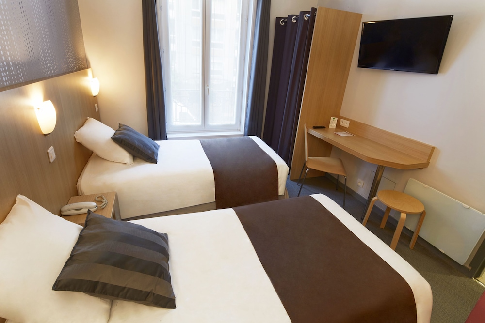 Habitación con 2 camas individuales del hotel HOTEL PARIS VILLETTE. Foto 4