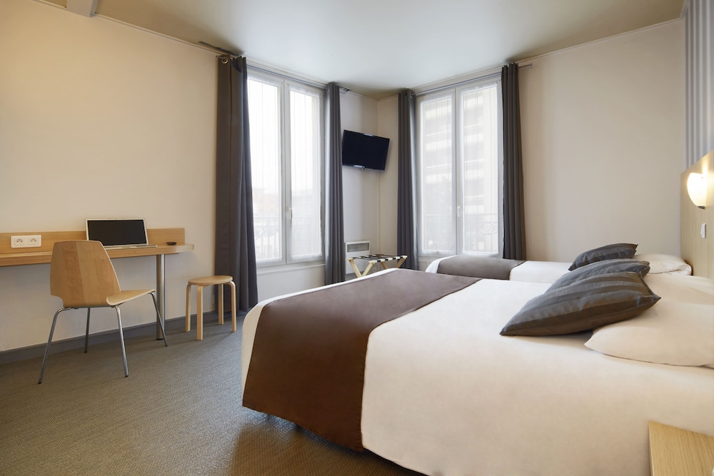Habitación triple del hotel HOTEL PARIS VILLETTE. Foto 3