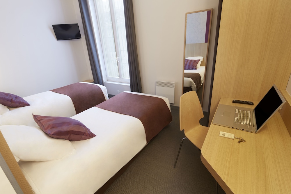 Oferta Familiar - 2 habitaciones independientes no comunicadas del hotel HOTEL PARIS VILLETTE. Foto 2