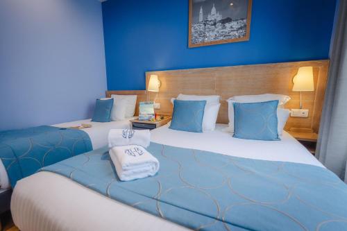 Habitación Triple del hotel Grand Dore. Foto 1