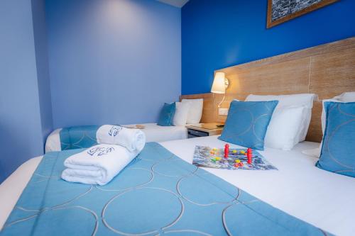 Habitación Triple del hotel Grand Dore. Foto 4