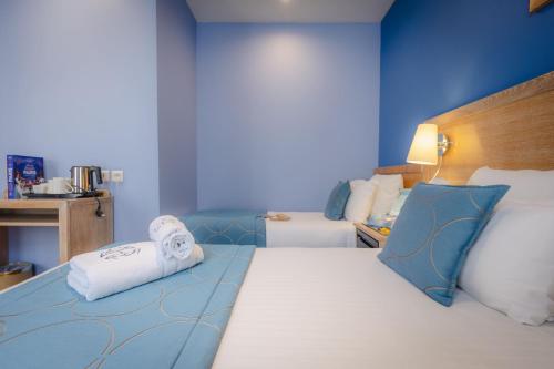 Habitación Triple del hotel Grand Dore. Foto 7