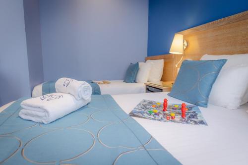 Habitación Triple del hotel Grand Dore. Foto 9