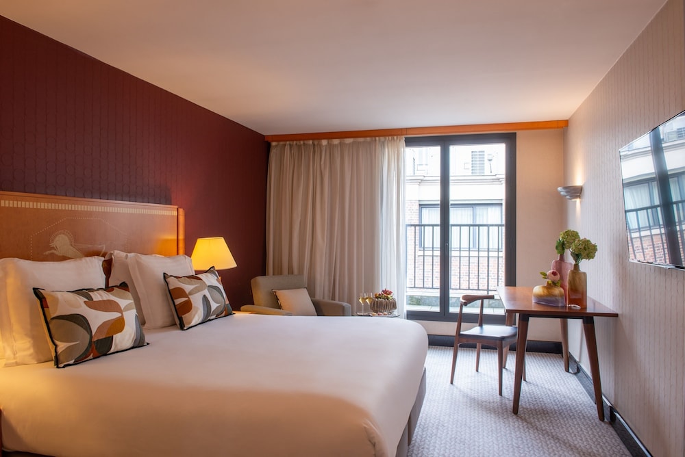 Habitación ejecutiva del hotel Les Jardins Du Marais. Foto 3