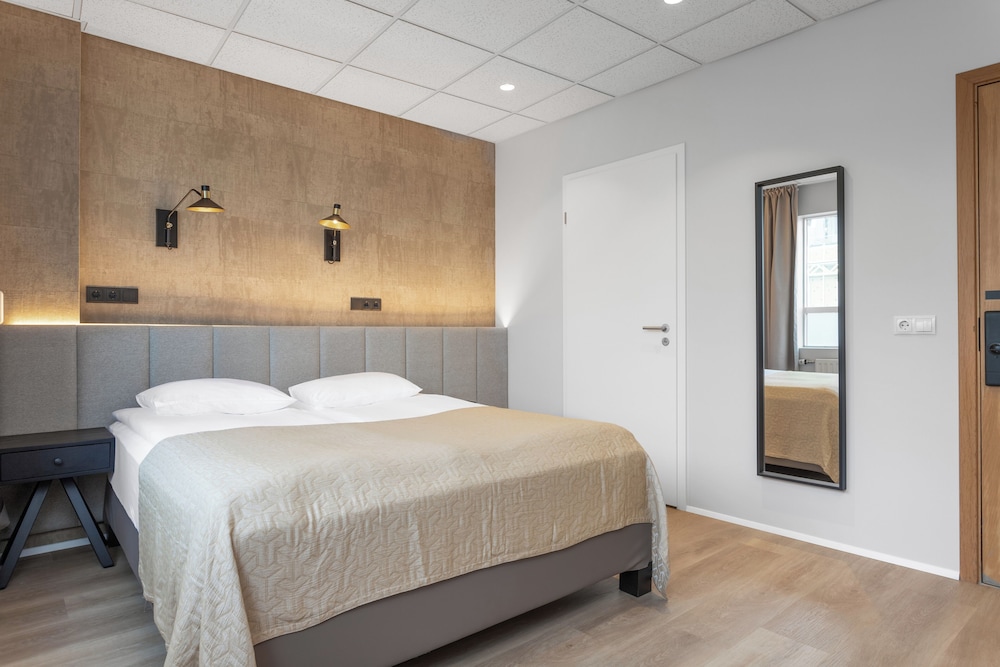 Habitación Deluxe doble, baño privado del hotel Alva Brautarholt