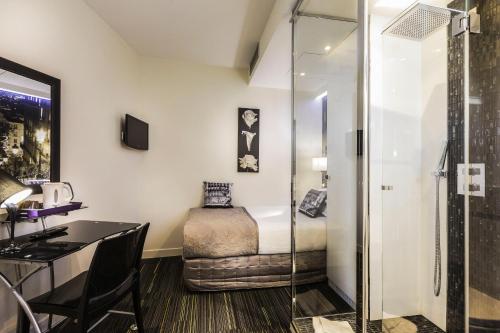 Habitación Individual del hotel Ile De France Opéra. Foto 1