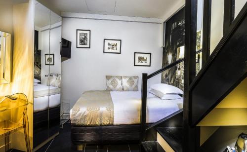 Habitación Individual del hotel Ile De France Opéra. Foto 4