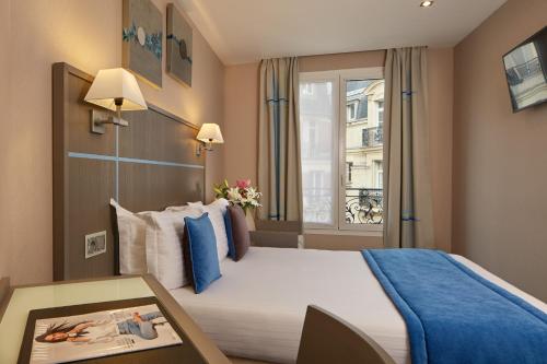Habitación Doble con bañera del hotel Alizé Grenelle Tour Eiffel. Foto 2
