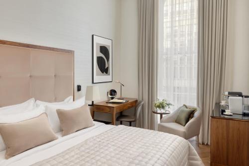 Habitación Deluxe - 1 cama grande del hotel The Queen's Gate