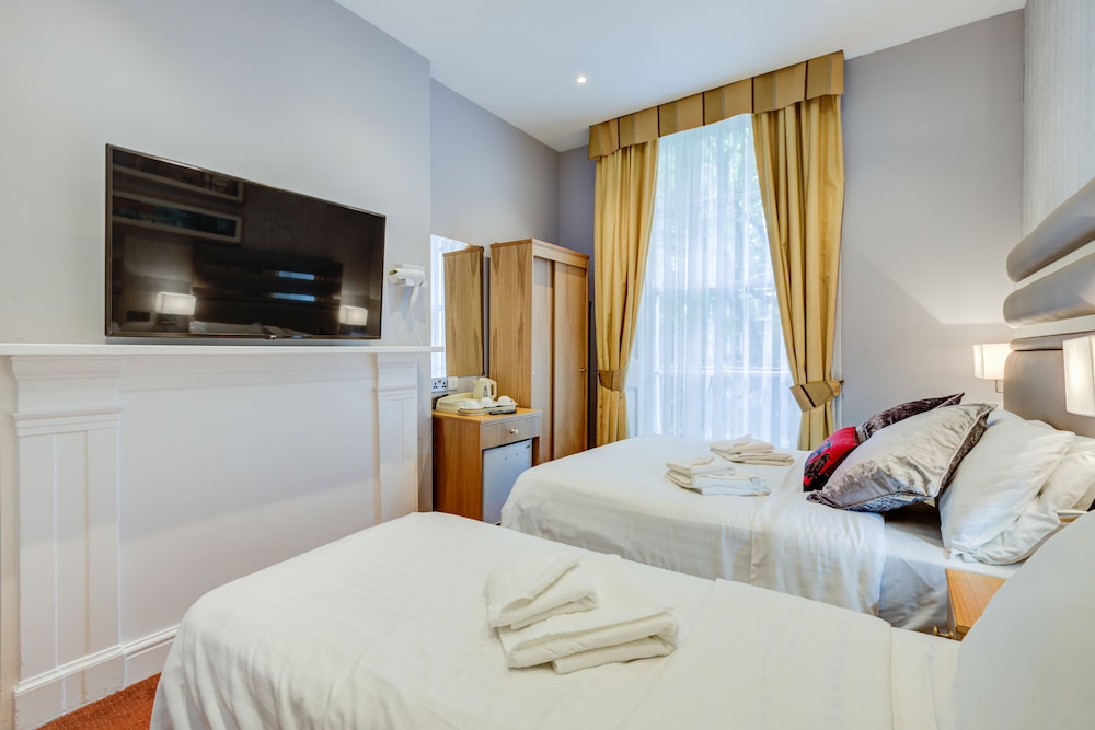 Habitación triple del hotel Admiral At Park Avenue