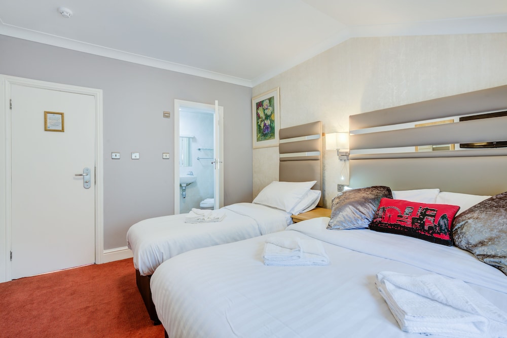 Habitación triple del hotel Admiral At Park Avenue. Foto 1