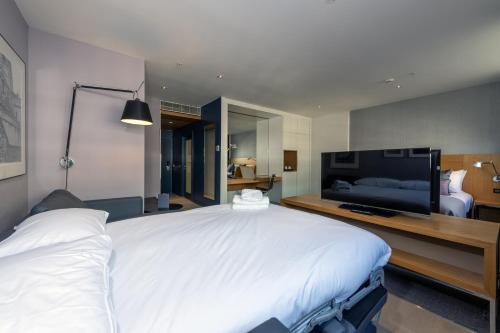 Habitación Familiar Deluxe del hotel Apex City Of London. Foto 2