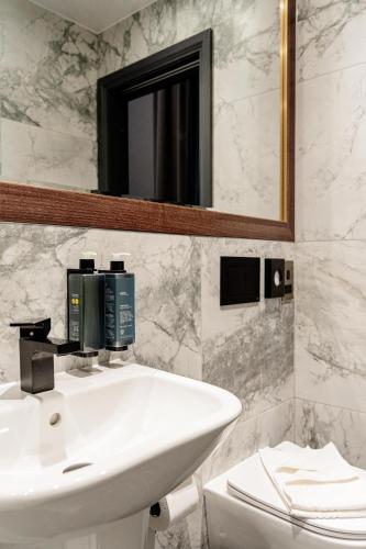 Habitación cuádruple del hotel The Blair Victoria. Foto 6