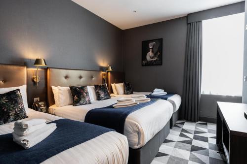 Habitación cuádruple del hotel The Blair Victoria. Foto 8