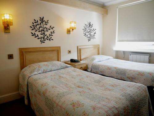 Habitación Doble Estándar - 2 camas del hotel Gresham. Foto 4