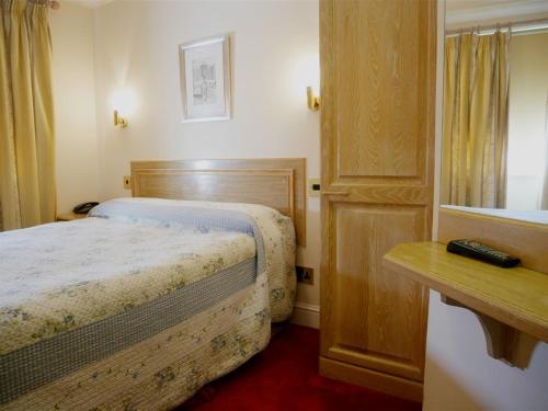 Habitación Doble Estándar del hotel Gresham. Foto 4