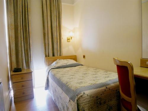 Habitación Individual Estándar del hotel Gresham. Foto 1