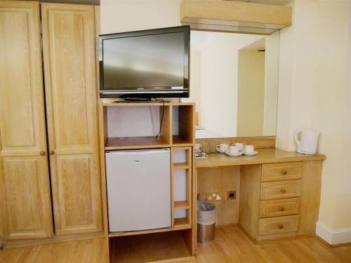 Habitación Cuádruple Estándar del hotel Gresham. Foto 3