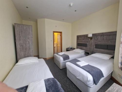 Habitación Triple del hotel 65 & Annexes. Foto 8