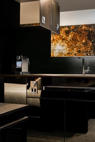 Habitación Deluxe Plus con sofá cama del hotel Heeton Concept - Luma Hammersmith. Foto 6