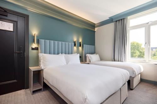 Habitación Triple del hotel The Edwin London. Foto 1