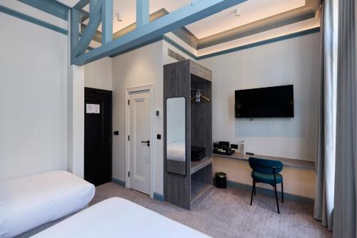 Habitación Triple del hotel The Edwin London. Foto 6