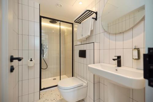 Habitación Triple del hotel The Edwin London. Foto 7